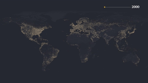 GIF of global map that displays lit up areas where clean energy power is being used in different parts of the world